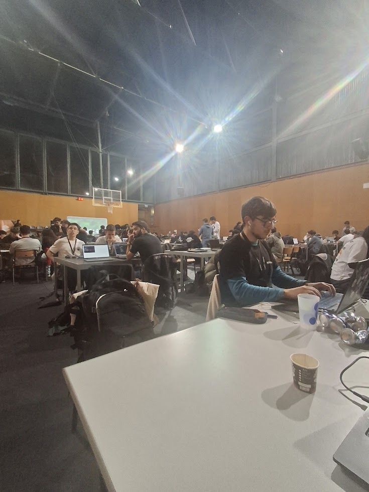 Hackathon venue with teams coding